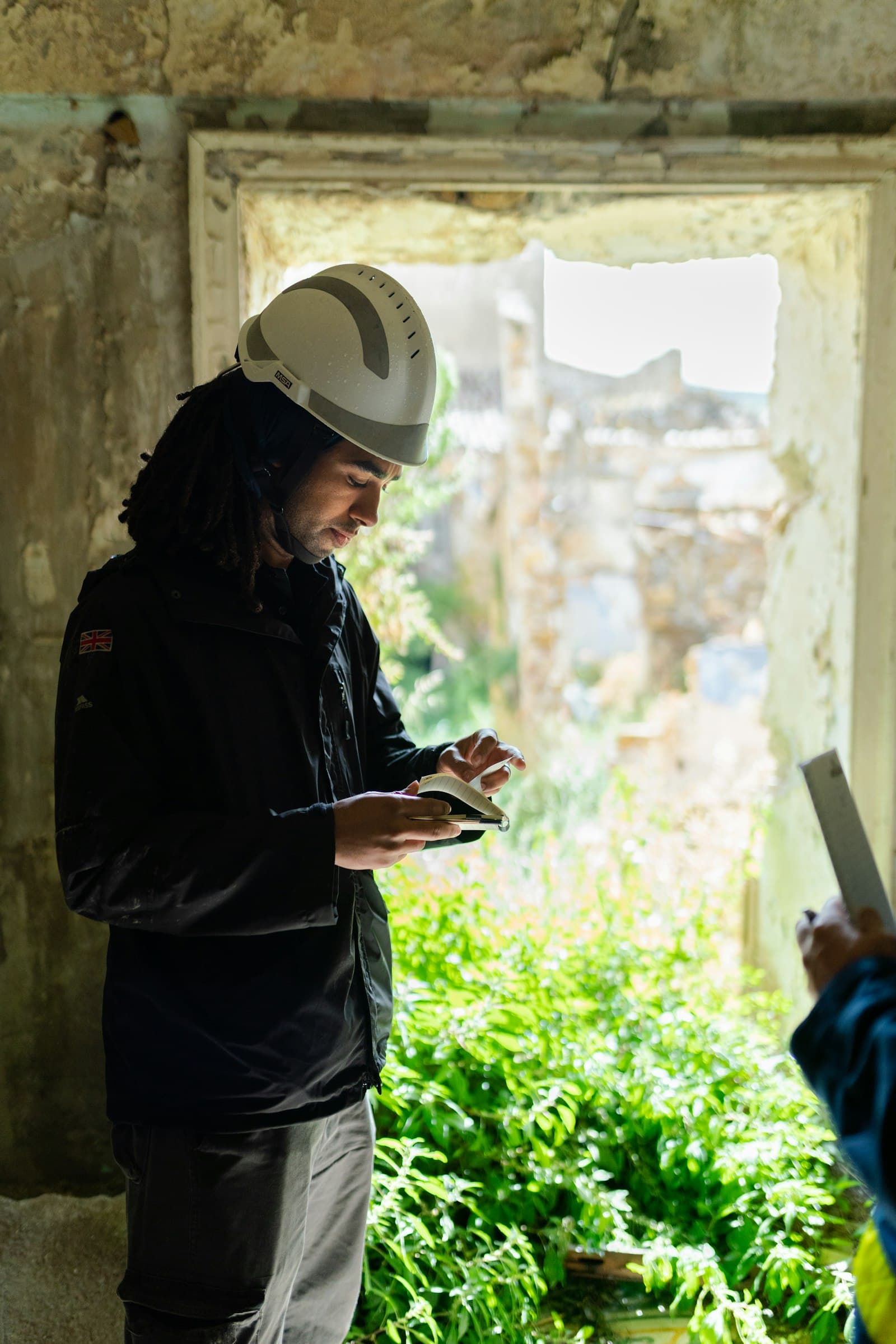 Inspector on site using a tablet